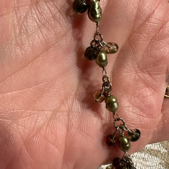 Beautiful amber stone hangs from chain with delicate clusters of small beads. - Picture 5 of 13